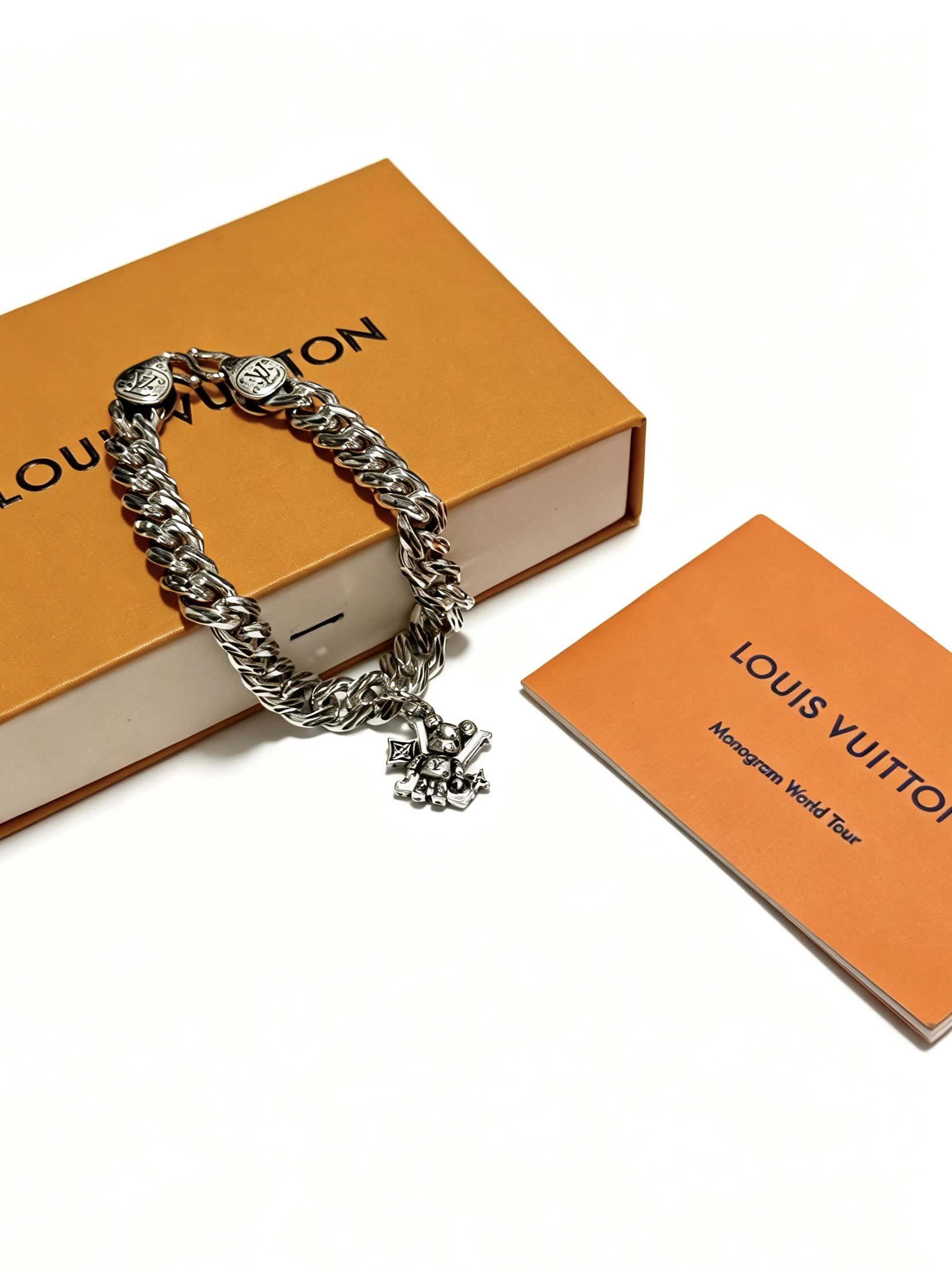 Louis Vuitton Silver Tone Bracelet with Monogram Charm